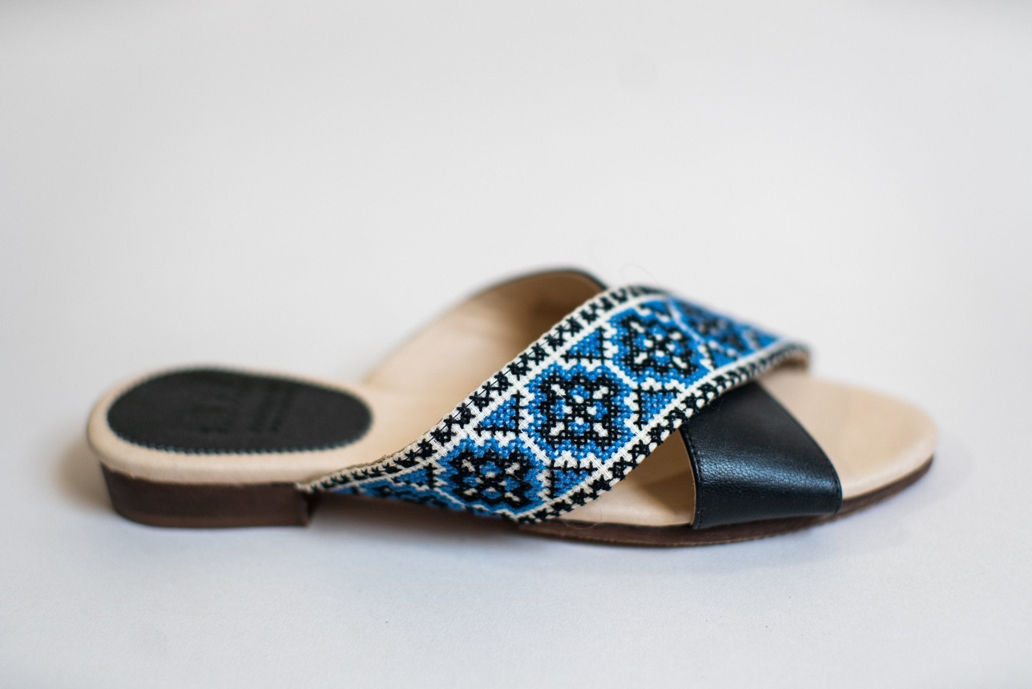 The Tatreez Cross Sandal in BlueCategory_Women Shoes from Darzah - SHOPELEOS