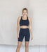 High-rise bike short by Girlfriend Collective | Midnightcategory_Womens Clothing from Girlfriend Collective - SHOPELEOS