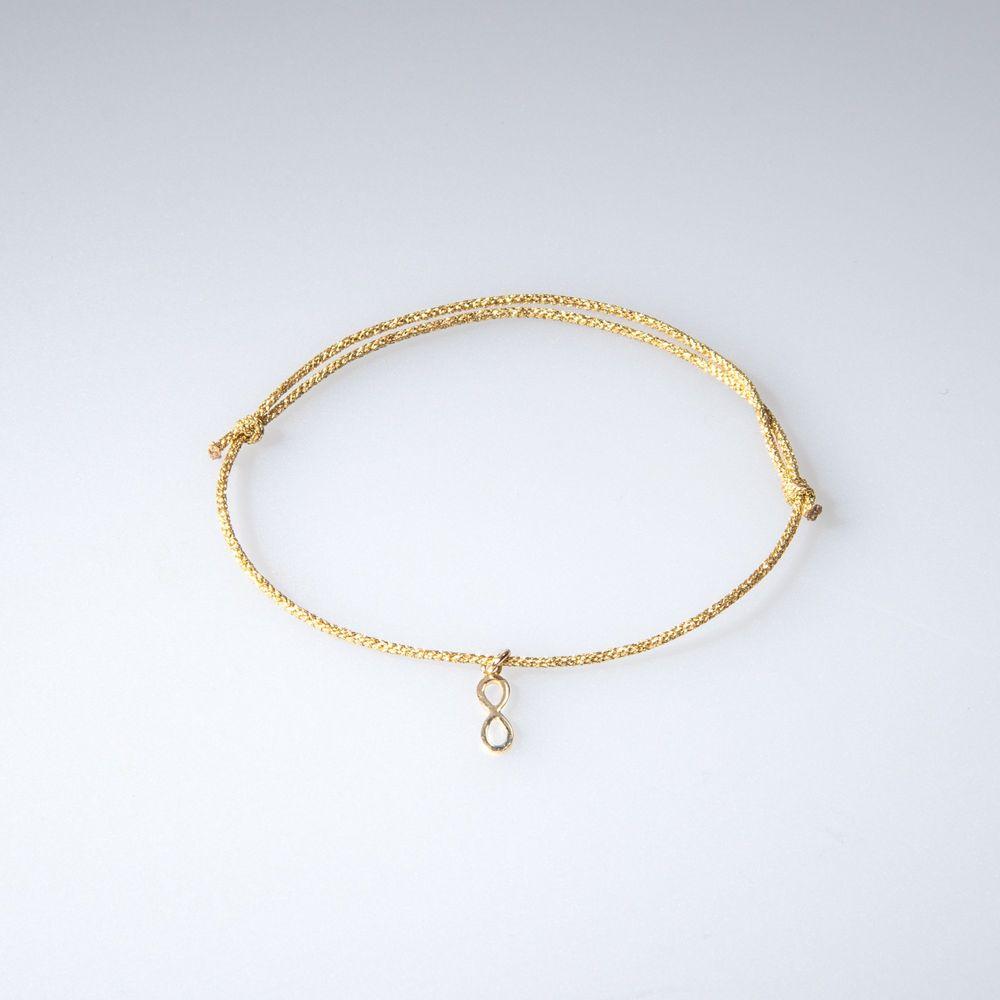 Gold Infinity Charm Bracelet from OIYA - SHOPELEOS